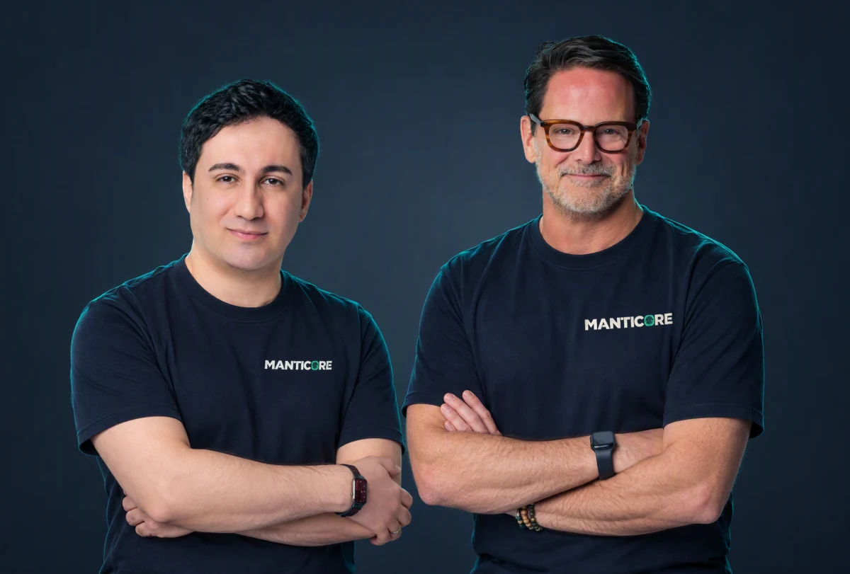 Saeid Atabaki (left) and John Loveland (right) wearing ManticoreAI T-shirts